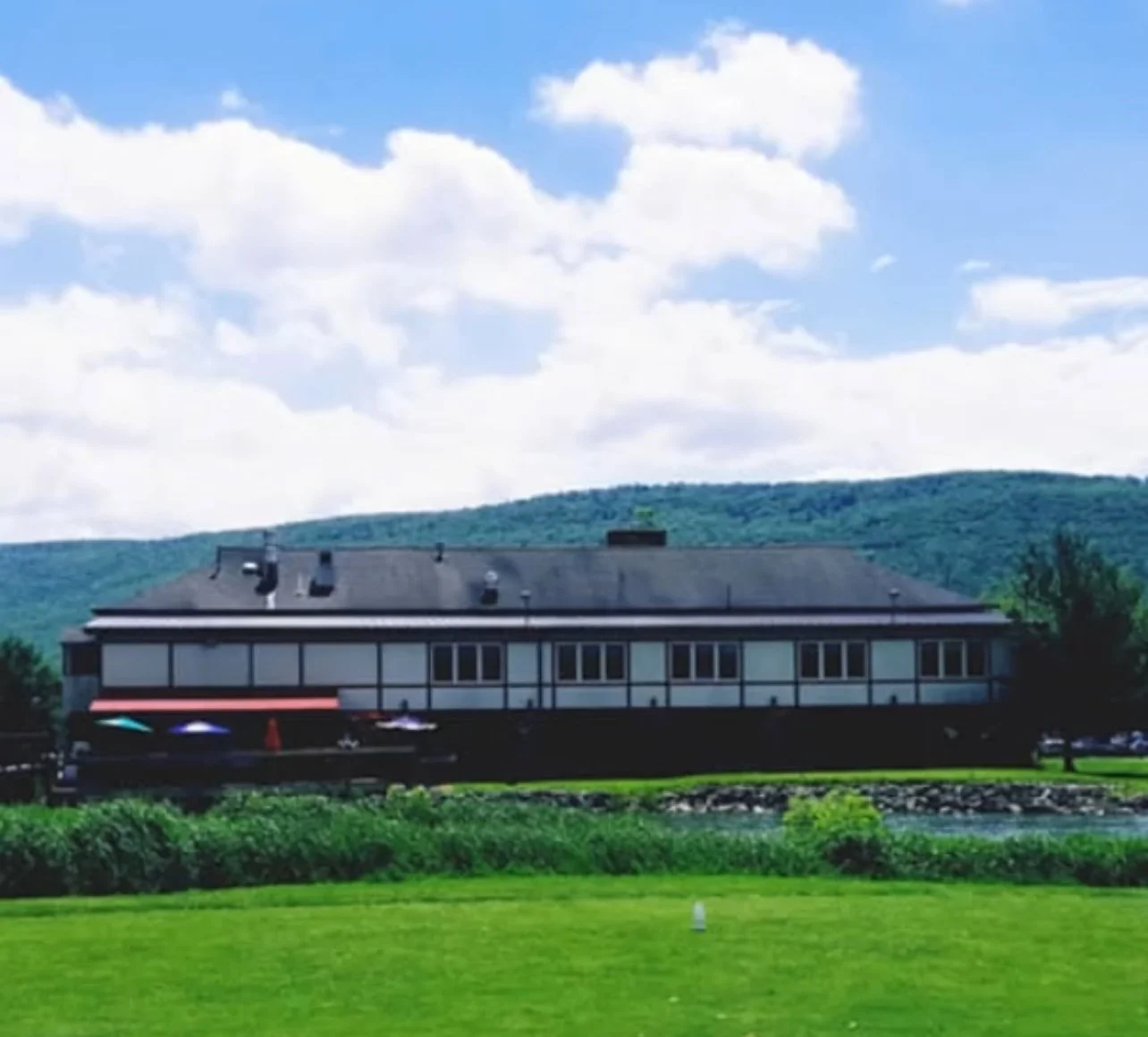 Haywood's clubhouse and the mountains beyond
