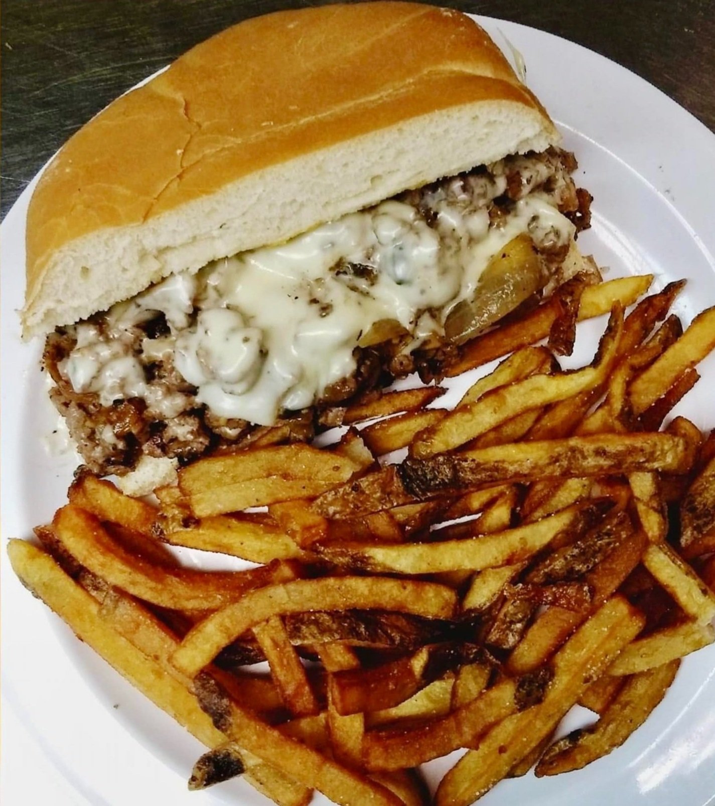 Pittsburgh-style cheesesteak with hand-cut fries