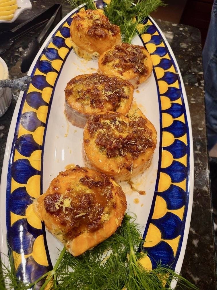 Plated salmon on a hand-painted platter